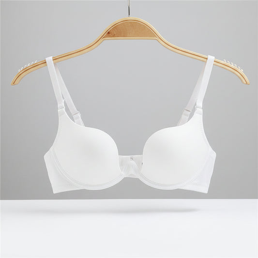 White bra on a hanger with a white background