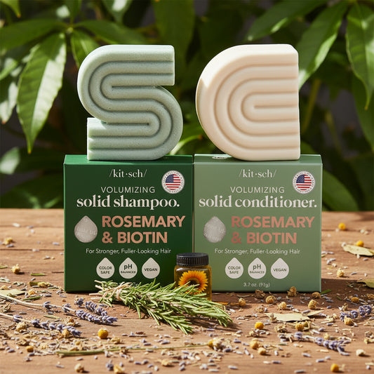 Kit-seh volumizing solid shampoo and conditioner bars with rosemary and biotin on a white background.