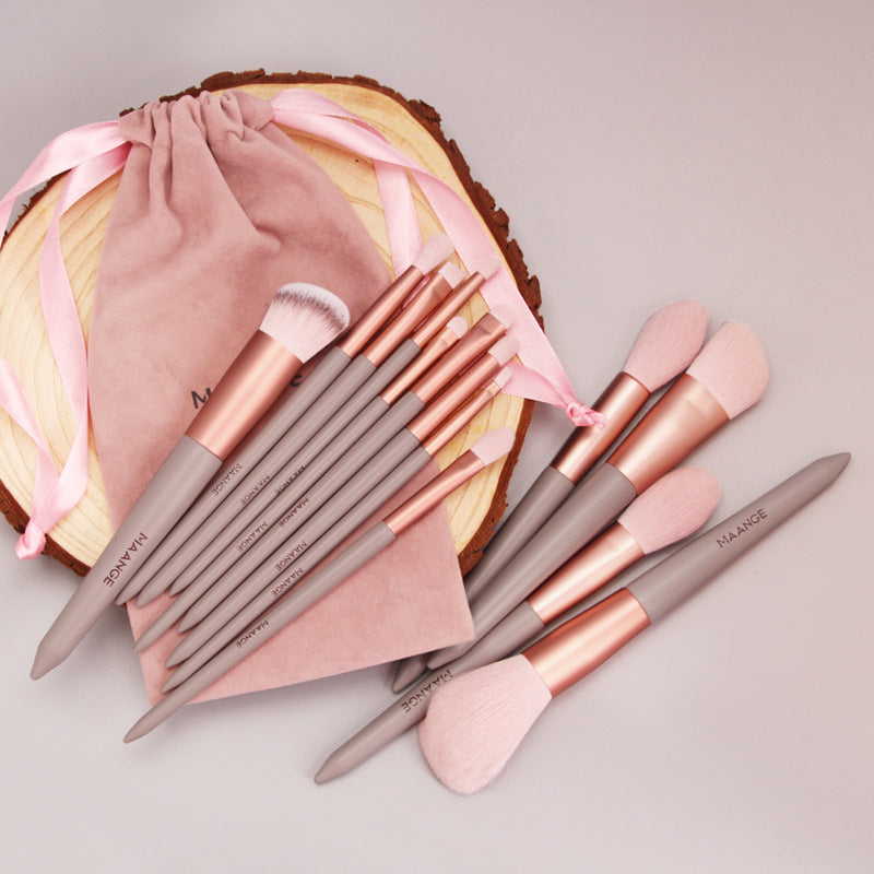 Zenvia Beauty MAANGE makeup brush set with multiple brushes for foundation, eyeshadow, and blush application arranged on a white surface.