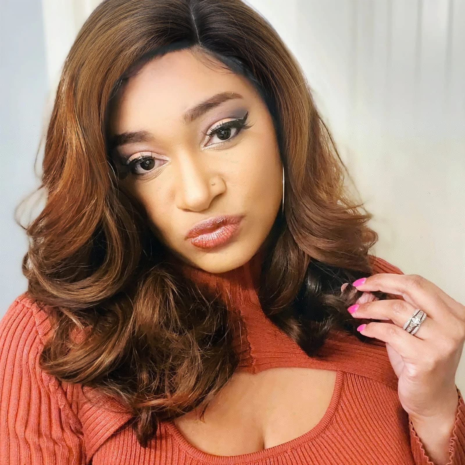 Zenvia Beauty loose wave bob wig with soft, flowing curls and natural hair color, styled for a chic, modern look.