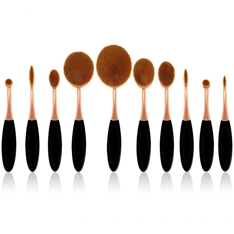 Set of 10 oval brushes from Zenvia Beauty with wooden handles and soft bristles for makeup application and blending.