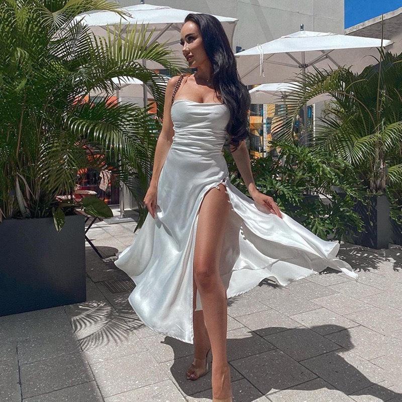 Zenvia Beauty high slit summer dress featuring lightweight fabric, flowing design, and stylish slit detail on a model.