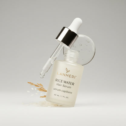 Lanmeri Rice Water Hair Serum with dropper on a white background