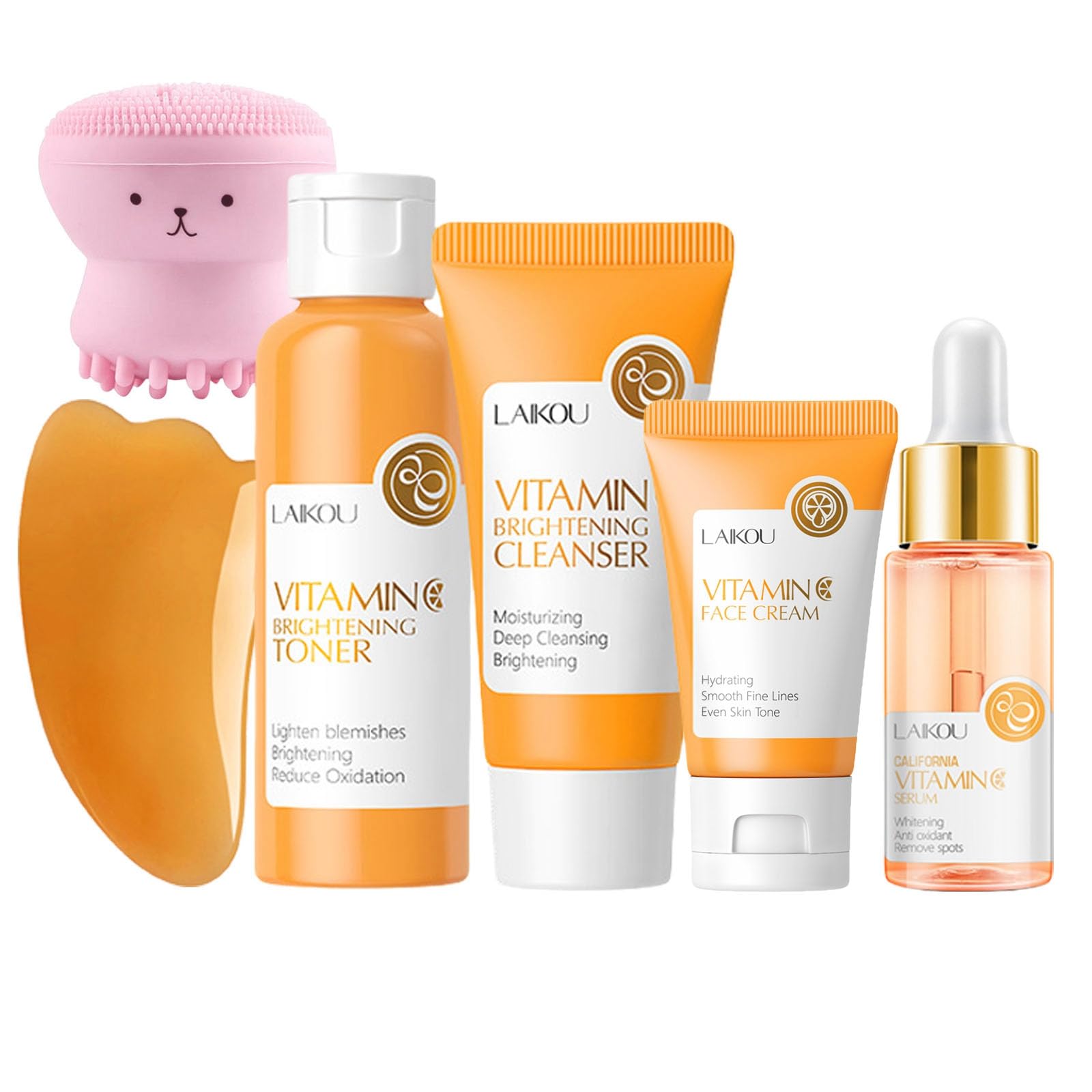 Zenvia Beauty Vitamin C skincare set with bottles and jars, featuring bright orange packaging and skincare products on a clean surface.