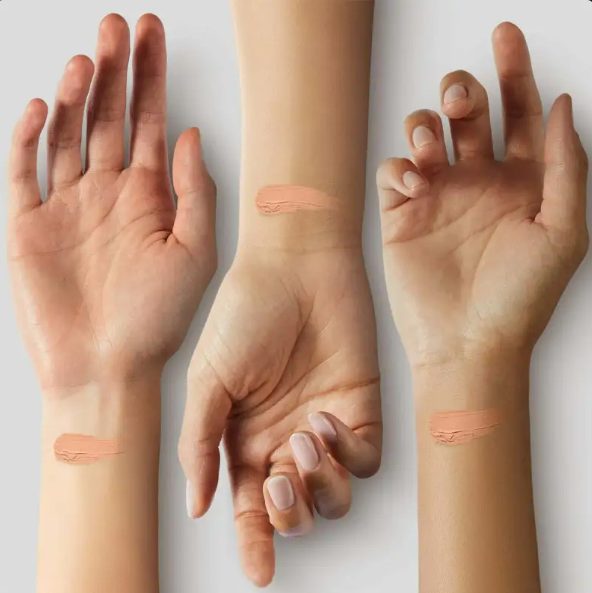 Color-changing concealer foundation by Zenvia Beauty in a sleek bottle, designed to match skin tones for flawless coverage
