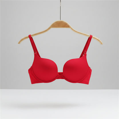 Red bra on a hanger with a blurred background
