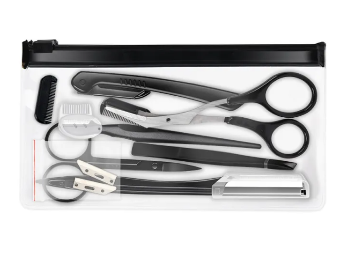 Black eyebrow trimming set by Zenvia Beauty with scissors, tweezers, and grooming tools on a white background.