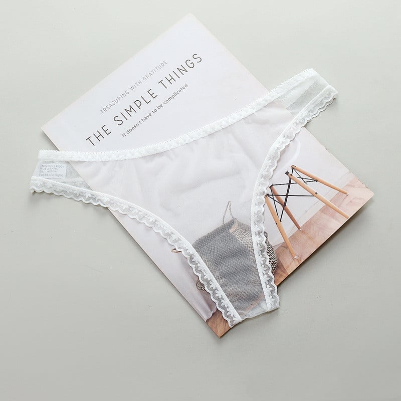 Transparent T-line panties from Zenvia Beauty with sheer fabric and minimalist design, displayed on a neutral background.