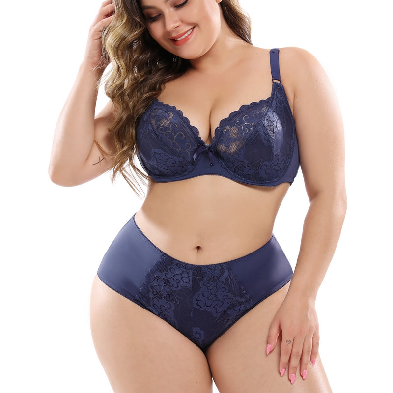 Plus size lace bra set by Zenvia Beauty featuring intricate lace details and supportive straps on a neutral background.
