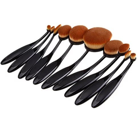 Zenvia Beauty 10-piece oval brush set with various makeup brushes arranged in a display, showcasing soft bristles and ergonomic handles.