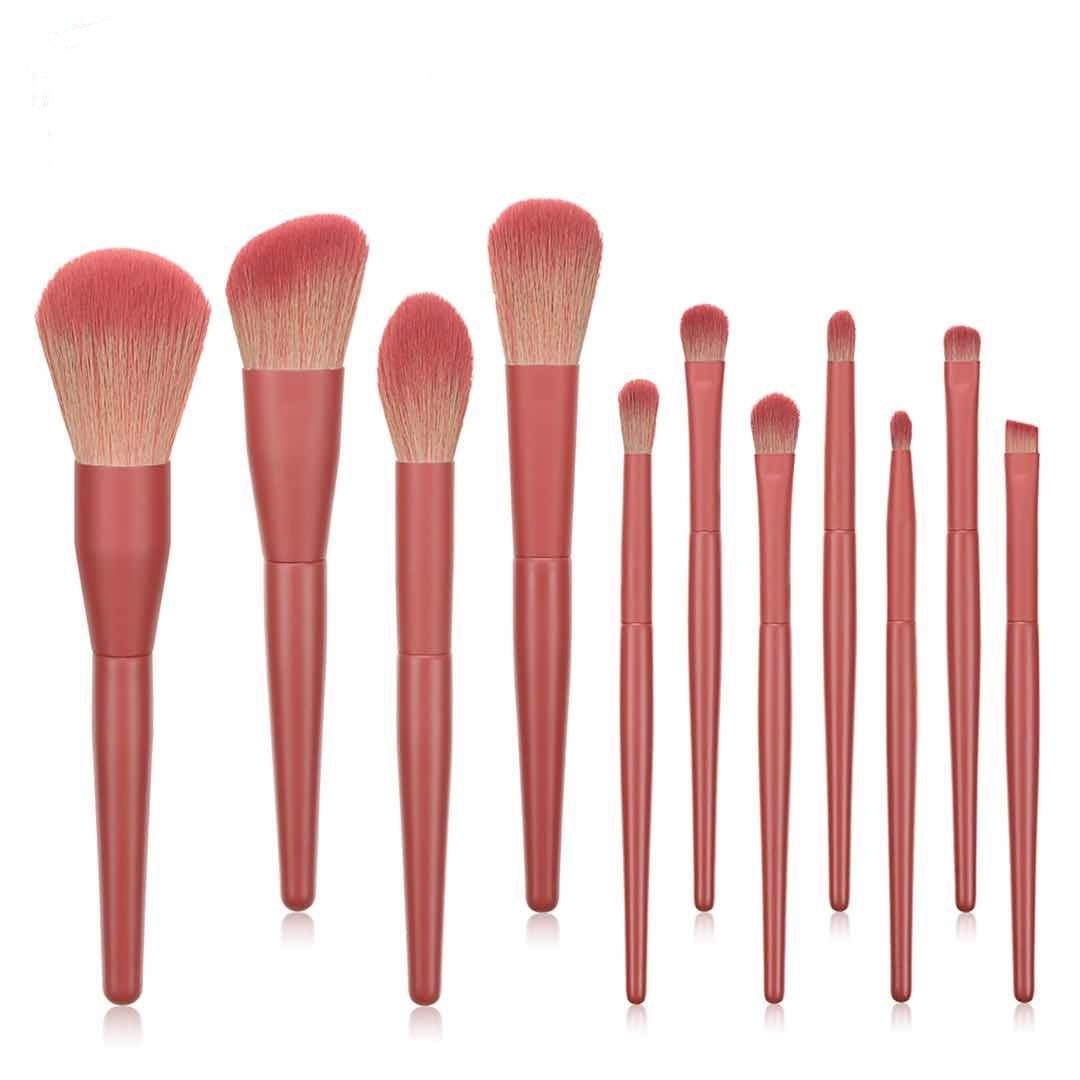 Set of yellow Zenvia Beauty makeup brushes with various brush heads on a white background