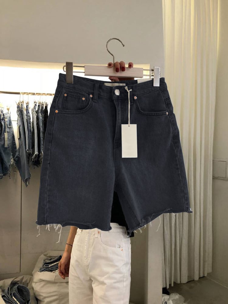 Women's casual denim shorts by Zenvia Beauty, featuring a classic blue wash, frayed hem, and relaxed fit.