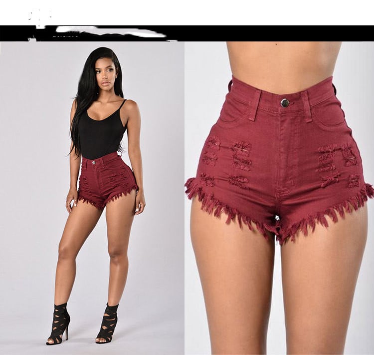 Women's stretchy frayed denim shorts by Zenvia Beauty, featuring distressed edges and a comfortable fit, styled for casual wear.