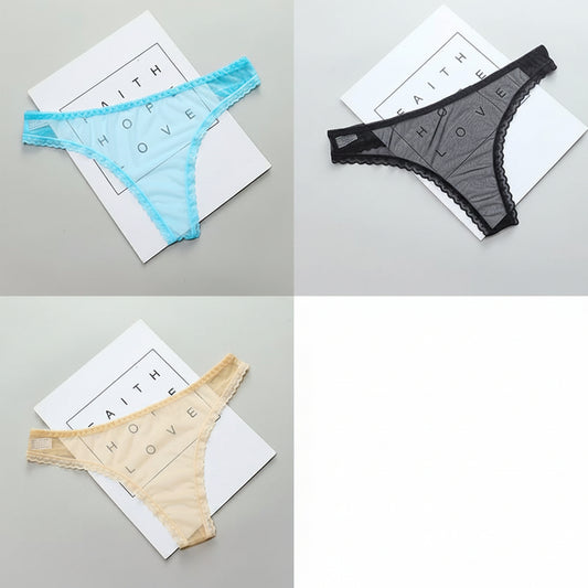 Four pairs of women's underwear in blue, black, beige, and multicolor on a gray surface with a white paper background.
