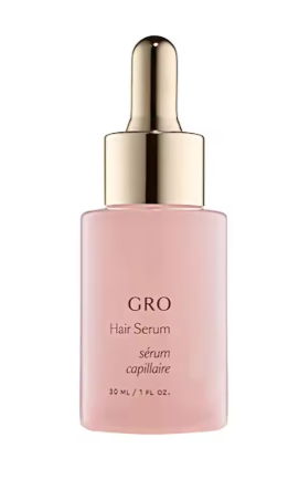 Zenvia Beauty Hair Growth & Strength Serum bottle with applicator and product label visible.