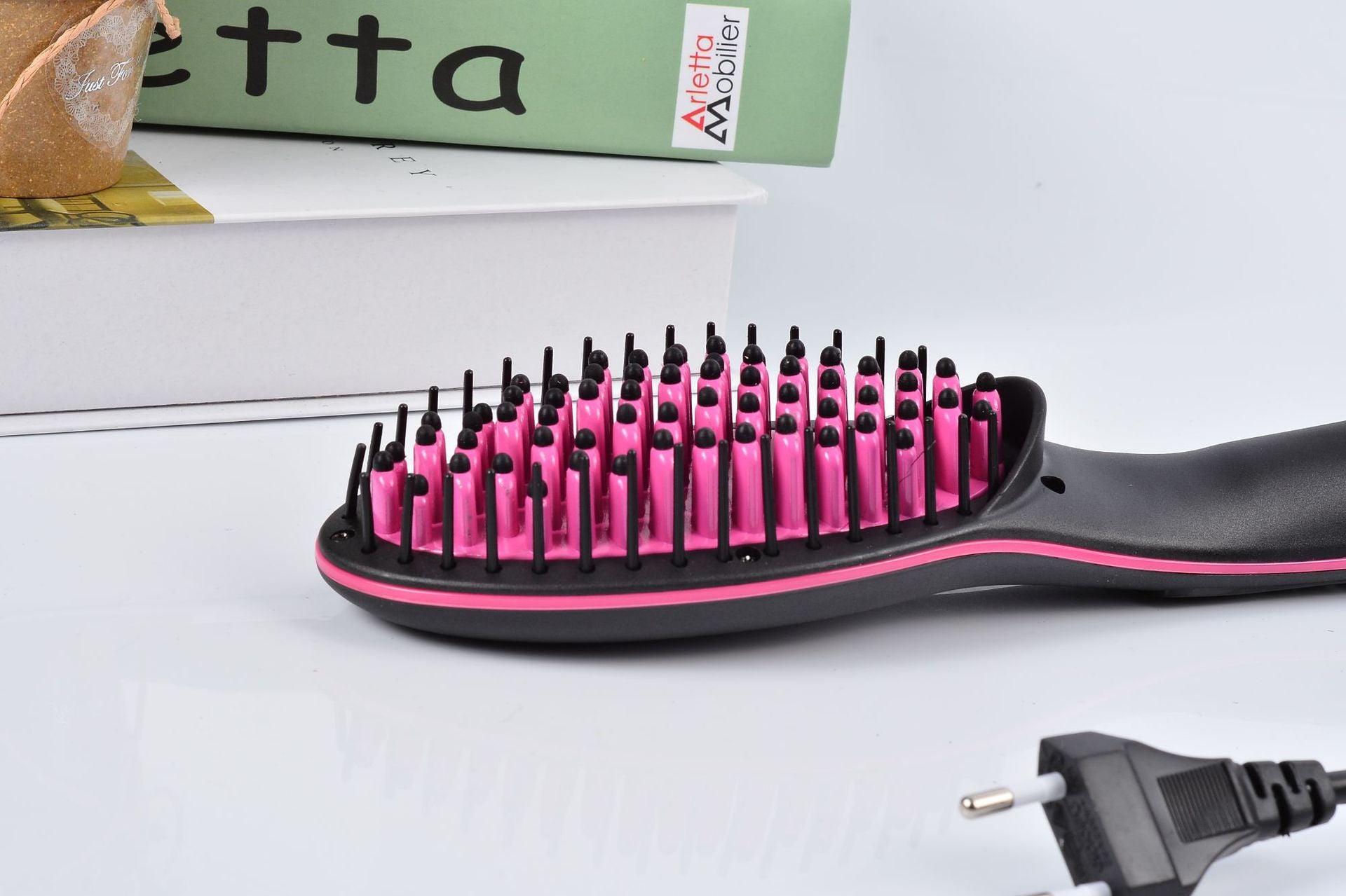 Zenvia Beauty ceramic hair styling brush with heat-resistant handle and bristles for smooth, shiny hair styling.