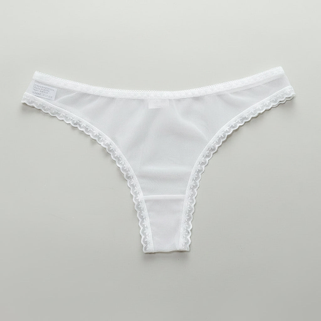 Transparent T-line panties by Zenvia Beauty showcasing sheer fabric and sleek T-line design on a neutral background.