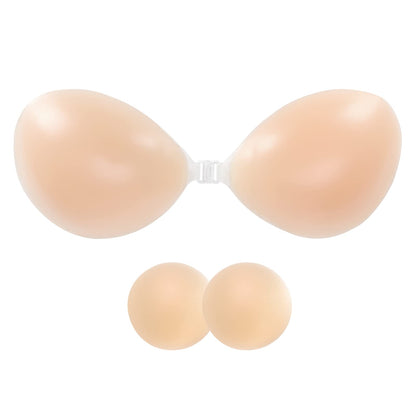 Beige silicone bra on a white background