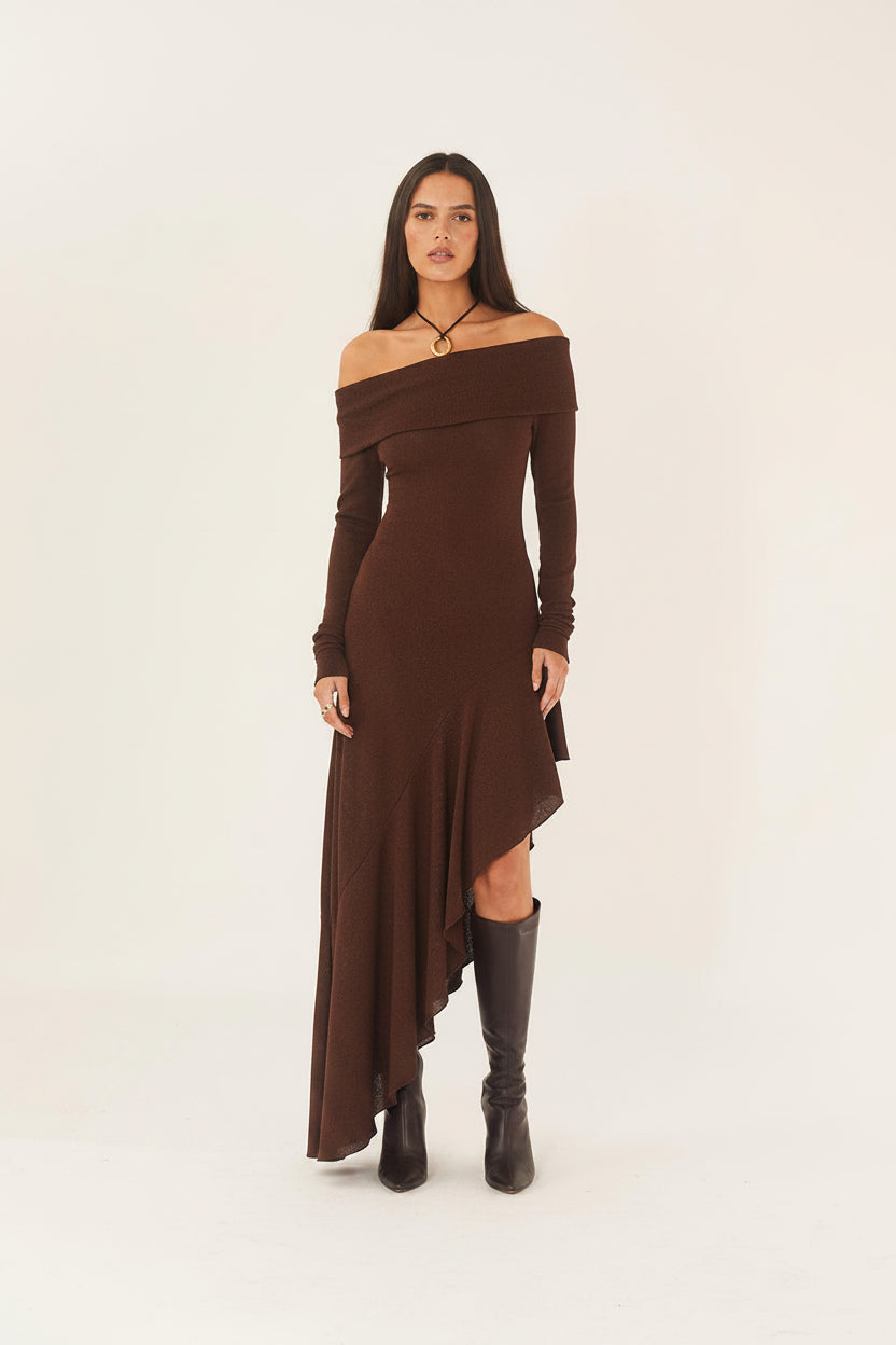 Women's ruffled long sleeve dress by Zenvia Beauty featuring a flowy silhouette and feminine ruffle details.