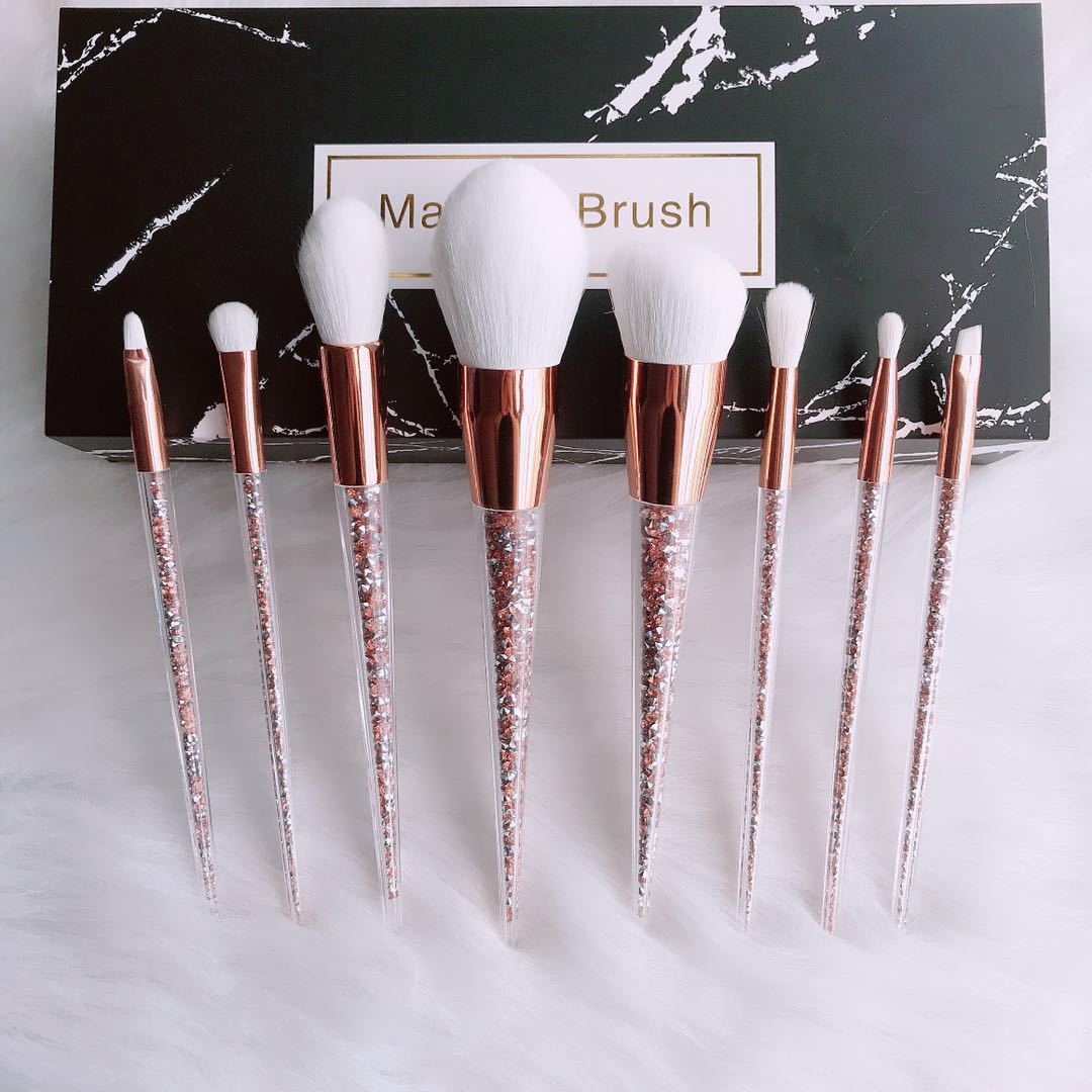 Zenvia Beauty 8-piece makeup brush set with various brushes for foundation, eyeshadow, and blush application arranged neatly.