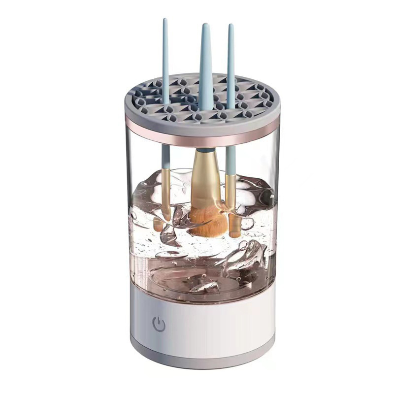 Zenvia Beauty electric makeup brush cleaner with a compact design, showing the device and makeup brushes in use.