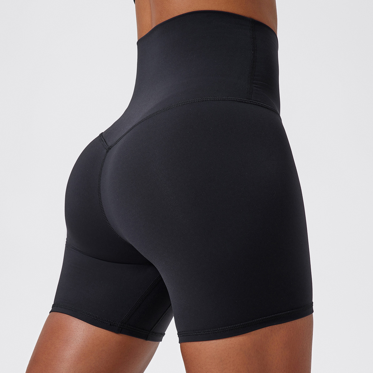 High waist sculpting shorts by Zenvia Beauty with firming fabric and seamless design, shown on a model.
