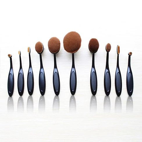 Set of 10 Zenvia Beauty oval brushes with wooden handles, perfect for makeup application and blending.