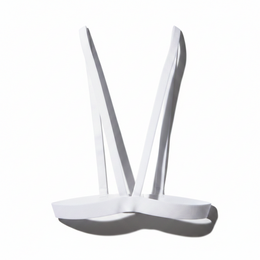 White plastic tray with two ladles on a white background