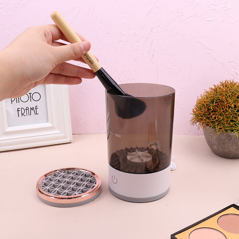 Zenvia Beauty electric makeup brush cleaner with a sleek device and cleaning brushes for easy makeup brush sanitation