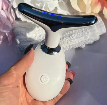 ZenviaBeauty Facial Massager™ in use, featuring sleek design for skin rejuvenation and facial massage therapy.